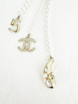 Chanel Triple Strand Pearl Pendant Necklace